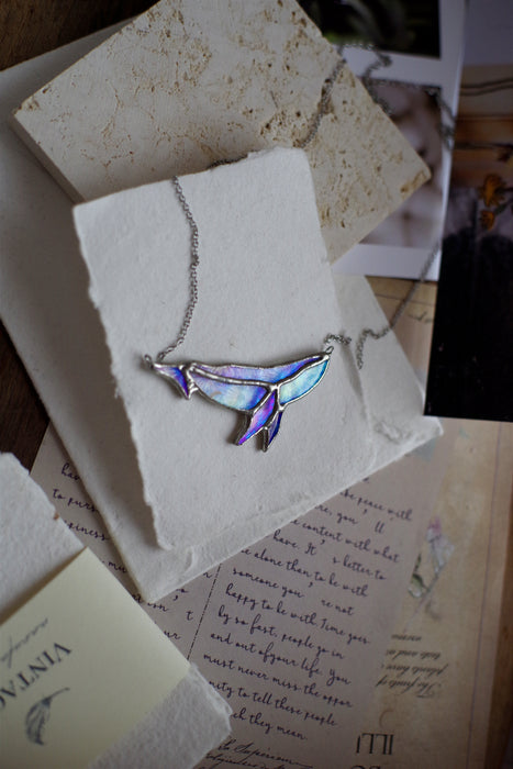 Iridescent whale necklace