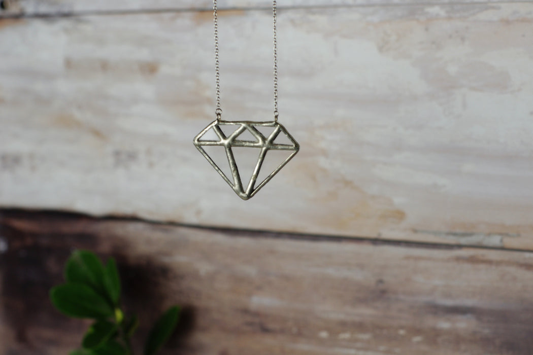 Diamond shaped pendant