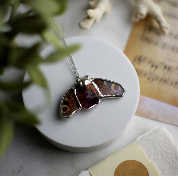 Butterfly wing necklace with mineral